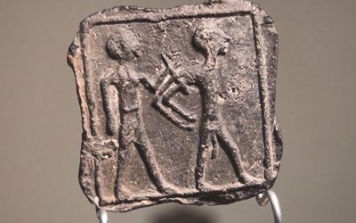 Kleitablet met ’n Kanaänitiese gevangene daarop